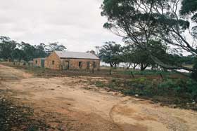 Groth stone hut and lake